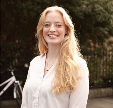 Natasha Lutz, a young white lady with long blonde hair