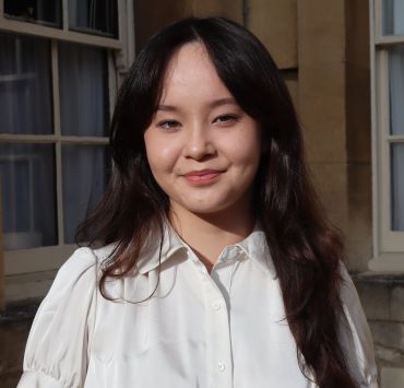 Sophia Suganuma, a young Asian lady with long black hair.