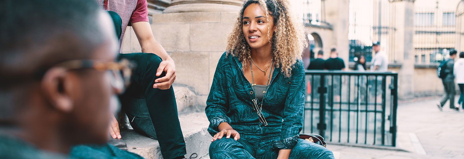 Black woman student with friends