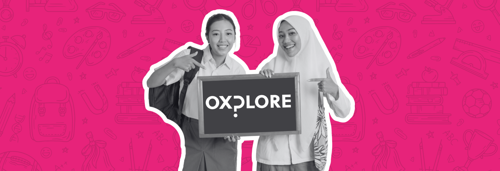 School children holding a board marked 'Oxplore'