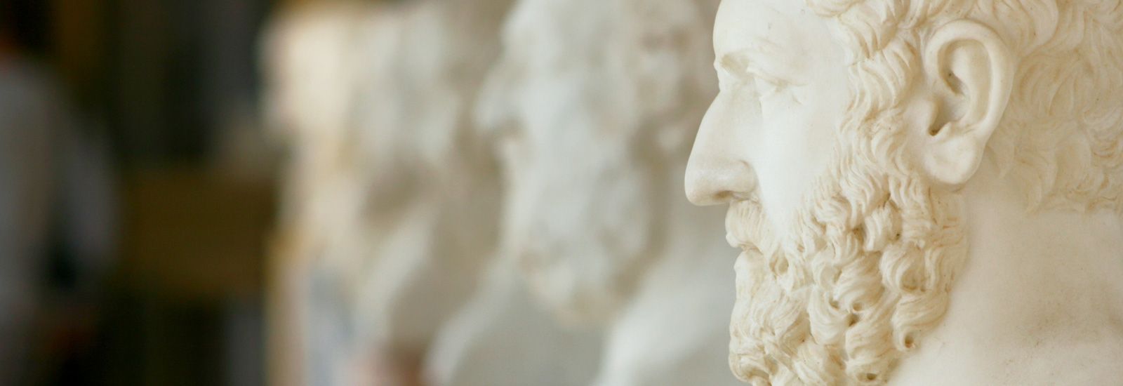Philosophers busts on the terrace of Achillion palace, Corfu, Greece.
