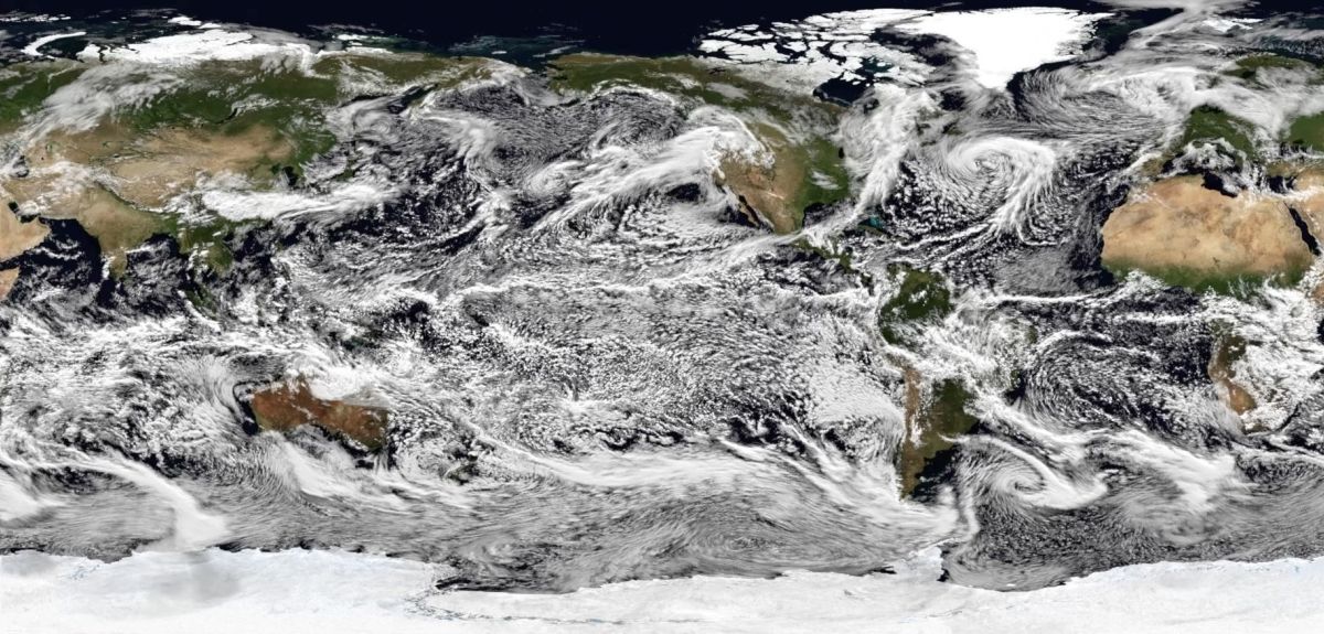 A satellite image-style world map with simulated cloud patterns. 