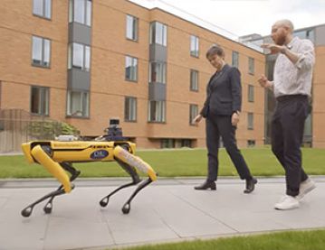 The VC and Nick Hawes with robotic dog